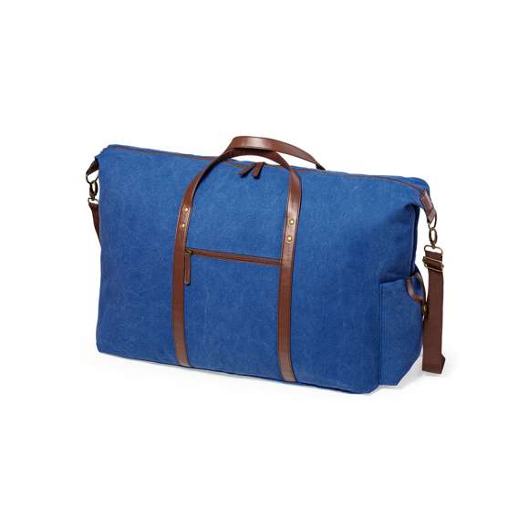 Elegante bolso fabricado en resistente canvas de 480g/m2, con prácticas y resistentes asas en polipiel alrededor del bolso. Compartimento principal con cierre de cremallera a juego con las asas y cinta para hombro ajustable con mosquetón. Incluye bolsillo exterior de fácil acceso.