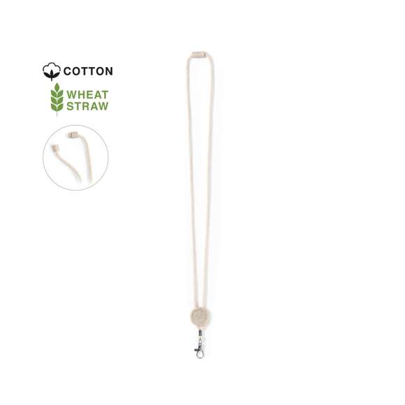 Lanyard de línea nature fabricado en resistente algodón 100%. Accesorio circular para personalización y cierre de seguridad en cuello fabricados en caña de trigo, con mosquetón metálico giratorio.La caña de trigo fomenta la utilización de materias primas naturales, reduciendo así las emisiones contaminantes.