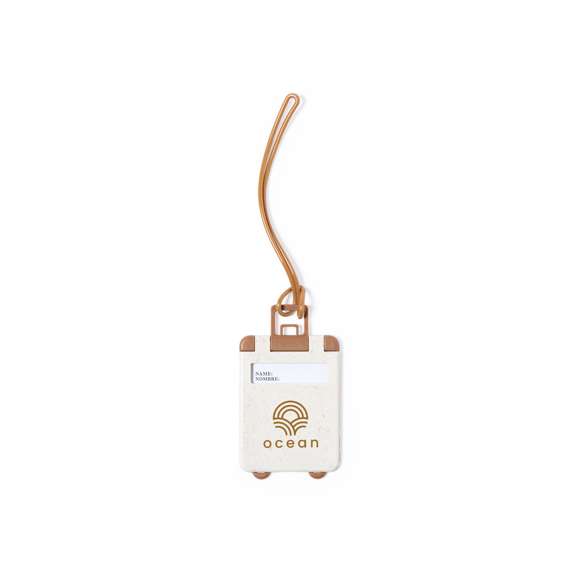 Identificador para maletas de línea nature y original diseño trolley, fabricado en caña de trigo. Con resistente cinta de acople y tarjeta de identificación en español e inglés.La caña de trigo fomenta la utilización de materias primas naturales, reduciendo así las emisiones contaminantes.