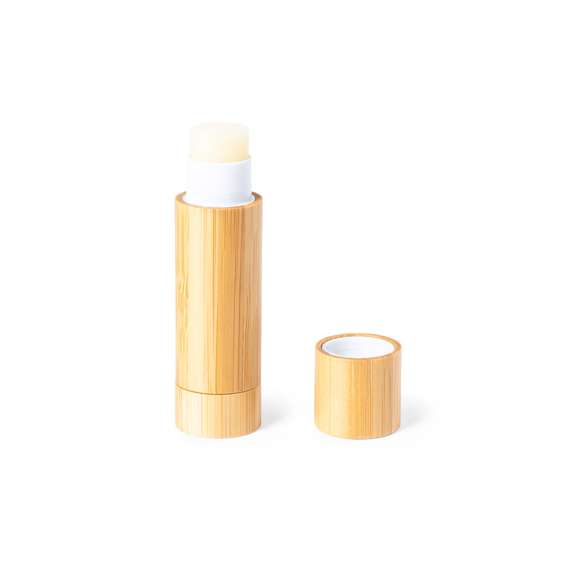 Bálsamo labial de línea nature, con aroma vainilla y protección SPF15. En envase dosificador de bambú con capucha.
