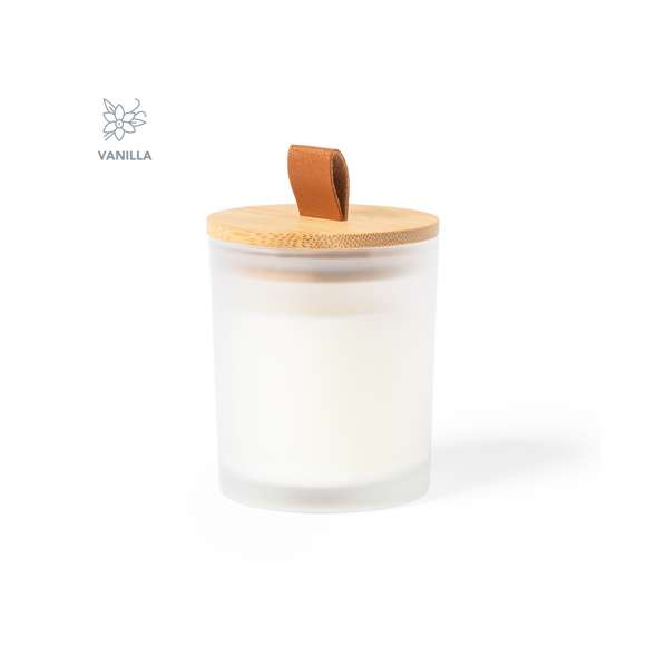 Vela aromática en tarrito de cristal con tapa de bambú. Disponible en cristal de variados colores y con distintos aromas según el color:Blanco aroma vainilla. Negro aroma sándalo. Rojo aroma canela.Verde aroma jazmín. Presentada en caja individual de diseño kraft.