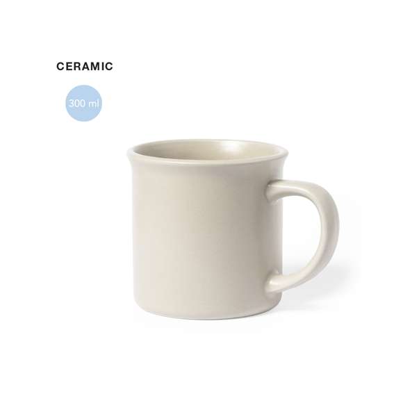 Taza de cerámica de 300ml de capacidad. De acabado mate y en color natural. Presentada en caja individual.