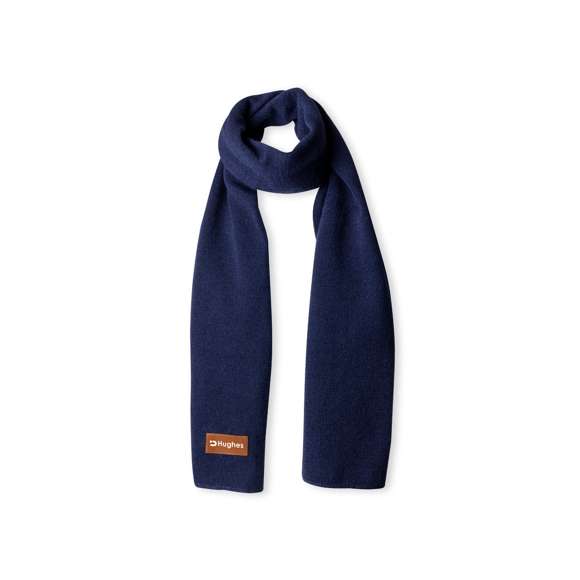 Bufanda unisex fabricada en material acrílico elástico. Con parche en polipiel cosido para marcaje y disponible en variada gama de colores.