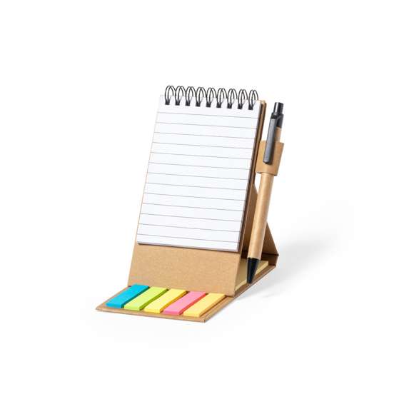 Bloc de notas de línea nature convertible en soporte para smartphone y fabricado en cartón reciclado. Incluye: Bloc de anillas de 30 hojas blancas, con disposición a una raya y soporte para bolígrafo. Bolígrafo en cartón reciclado con detalles en negro, de mecanismo pulsador y en tinta azul.25 notas adhesivas medianas.125 mininotas adhesivas en varios colores.