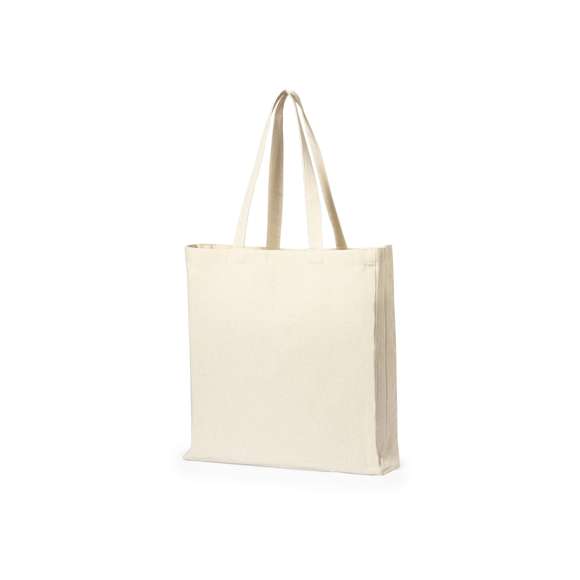 Bolsa fabricada en algodón 100%, de acabado natural y en 220g/m2. De acabado cosido, con fuelle en base y asas medianas reforzadas (60 x 2,5 cm). Resistencia hasta 10 kg de peso.