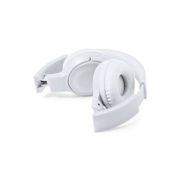 Auriculares plegables de diadema con conexión Bluetooth® 5.0, con cuerpo y almohadillas a juego, disponibles en variada gama de colores. Panel de control integrado en el auricular, función manos libres y radio FM  con ranura para tarjetas micro SD y entrada de línea mediante conexión jack de 3,5 mm. Recargables mediante cable USB -incluido- y con batería integrada de 200mAh. Almohadillas en suave polipiel con interior a juego y presentados caja individual de diseño kraft.