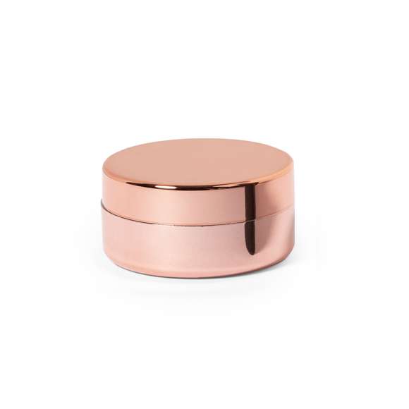 Bálsamo labial en elegantes colores dorado, plateado y oro rosa. Aroma vainilla, con protección SPF15 y dermatológicamente testado. Con tapa a rosca y acabado brillo.