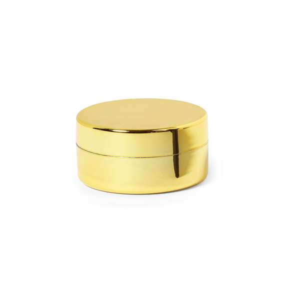 Bálsamo labial en elegantes colores dorado, plateado y oro rosa. Aroma vainilla, con protección SPF15 y dermatológicamente testado. Con tapa a rosca y acabado brillo.