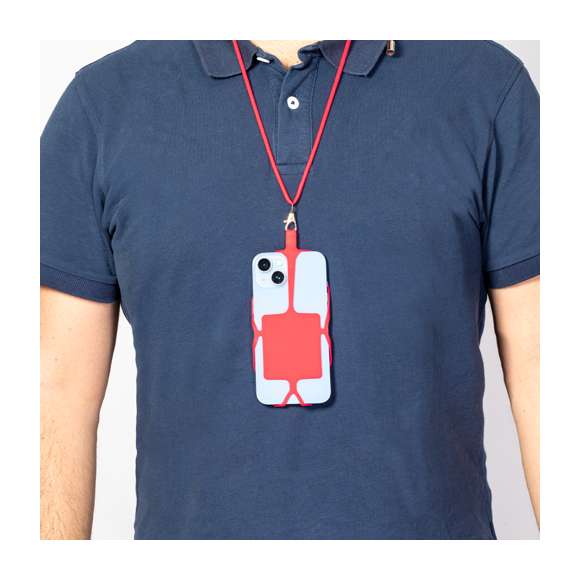 Original lanyard portamóvil en resistente poliéster y flexible silicona. Con accesorio de transporte para todo tipo de smartphones, capaz de ajustarse a todas las pantallas. Ajustador en cuello y extremos de cordones en acabado cromado. Incluye amplia zona de marcaje. Disponible en variada gama de colores.