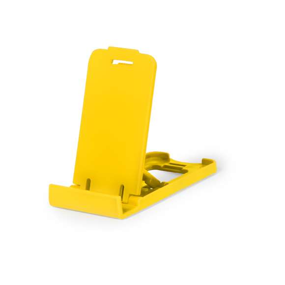 Soporte para smartphone y tablet fabricado en resistente PP. De diseño compacto y plegable para poder llevarlo a cualquier lado. Con distintas posiciones de inclinación. Disponible en amplia gama de colores. Presentado en bolsa individual reciclada.