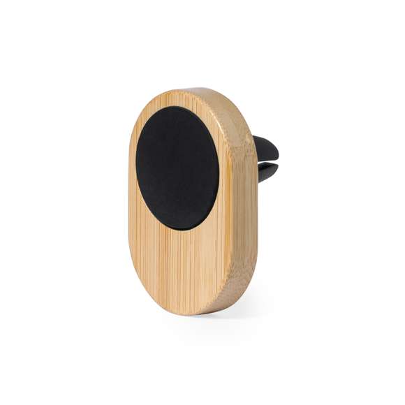 Soporte de rejilla de coche para smartphone fabricado en bambú. Cómoda y segura fijación magnética. Incluye anillo adhesivo. Presentado en caja individual de diseño eco en cartón kraft.Materiales como el bambú fomentan la utilización de materias primas naturales, reduciendo las emisiones contaminantes. Proviene de una planta de gran resistencia, con versatilidad de crecimiento y regeneración rápida, siendo una excelente alternativa al uso de madera tradicional.