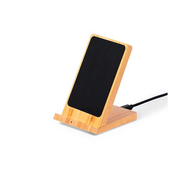Cargador inalámbrico con función soporte para smartphone. Fabricado en bambú, con superficie en elegante color negro. Luz led interior y recubrimiento exterior especialmente diseñado para marcaje en láser, iluminando así el logotipo. Con función carga de 15W y compatible con dispositivos equipados con tecnología Qi. Amplia superficie de marcaje y presentado en atractiva caja de diseño kraft.