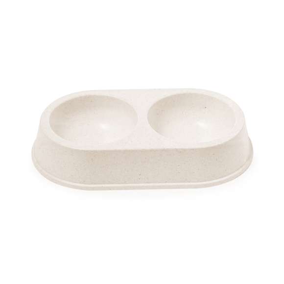 Bowl para mascotas de doble compartimento fabricado en fibra de bambú. Ideal para la alimentación de mascotas, gracias a sus dos divisiones para sólidos y líquidos. Presentado en una bolsa individual reciclada. Materiales como el bambú fomentan la utilización de materias primas naturales, reduciendo las emisiones contaminantes. Proviene de una planta de gran resistencia y versatilidad, con crecimiento y regeneración rápidos, siendo una excelente alternativa al uso de madera tradicional.