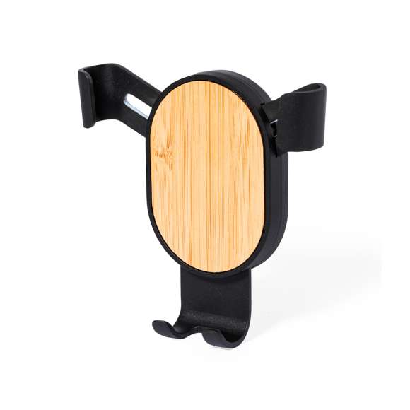 Ingenioso soporte para smartphone de diseño minimalista y especialmente diseñado para smartphones tamaño XXL. Elegante diseño negro con detalles en bambú, con sistema de fijación universal que se adapta por el propio peso del teléfono, ajustando las pinzas de agarre una vez que se sitúa el dispositivo en el soporte, con base rotatoria 360º. Para rejilla de ventilación del automóvil y con frontal especialmente diseñado para marcaje. Presentado en caja de diseño kraft. Materiales como el bambú fomentan la utilización de materias primas naturales, reduciendo las emisiones contaminantes. Proviene de una planta de gran resistencia y versatilidad, con crecimiento y regeneración rápidos, siendo una excelente alternativa al uso de madera tradicional.