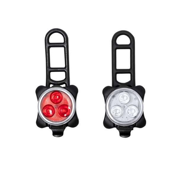 Kit de luces de seguridad para bicicleta fabricadas en silicona y ABS. Este conjunto consta de dos piezas: una luz blanca para el frontal y otra luz roja para la parte trasera, mejorando la visibilidad. Equipadas con tres potentes LEDs, que ofrecen 4 modos de iluminación: fijo de intensidad alta o media, e intermitente rápido o lento. Recargable gracias a su batería de 650 mAh de capacidad, con cable de carga incluido. Con accesorios de acople válidos para cualquier bicicleta y presentado en caja de diseño kraft.
