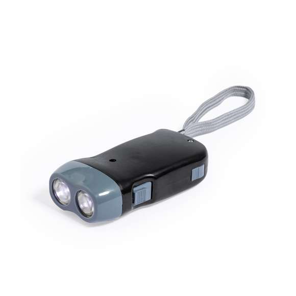 Linterna eco-amigable con 2 LEDs de carga manual mediante la dinamo incorporada; simplemente apretando el gatillo con una mano se genera energía, ofreciendo una fuente de luz sin generar residuos. En elegante color negro y gris, incluyeendo una cinta de transporte para mayor comodidad. Presentada en caja de diseño kraft.