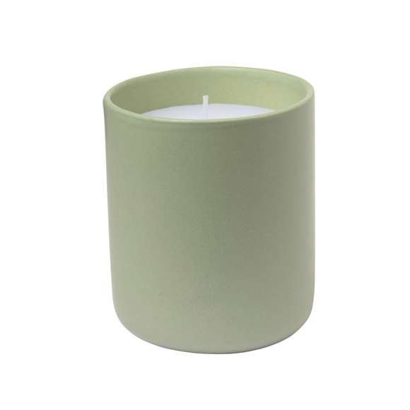 Vela aromática en tarro de cerámica con aroma a vainilla. Disponible en cristal de elegantes colores de tonos naturales. Presentada en caja individual diseño kraft.