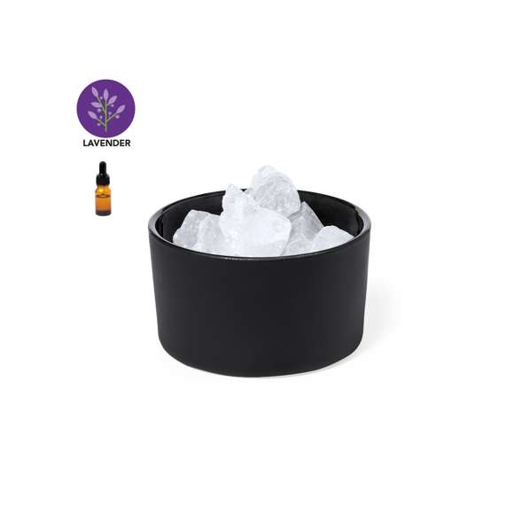 Difusor aromático natural. Utilizando la inducción natural permite la difusión del aroma, aplicando unas gotas sobre las piedras de cristal. Incluye 10 piedras de cristal, un cuenco y 10 ml de aceite aromático con fragancia a lavanda. Presentado en caja de diseño kraft.