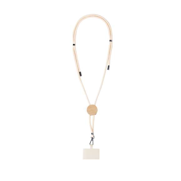 Original lanyard con accesorio para smartphone. Fabricado en resistente algodón, con accesorio de bambú para marcaje. Accesorio de transporte para situar entre la funda y el smartphone y mosquetón giratorio metálico. Ajustadores en cuello, con accesorios cromados en los extremos de los cordones de ajuste.Materiales como el bambú fomentan la utilización de materias primas naturales, reduciendo las emisiones contaminantes. Proviene de una planta de gran resistencia y versatilidad, con crecimiento y regeneración rápidos, siendo una excelente alternativa al uso de madera tradicional.