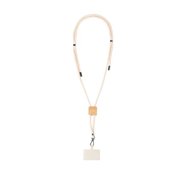 Original lanyard con accesorio para smartphone. Fabricado en resistente algodón, con accesorio de bambú para marcaje. Accesorio de transporte para situar entre la funda y el smartphone y mosquetón giratorio metálico. Ajustadores en cuello, con accesorios cromados en los extremos de los cordones de ajuste.Materiales como el bambú fomentan la utilización de materias primas naturales, reduciendo las emisiones contaminantes. Proviene de una planta de gran resistencia y versatilidad, con crecimiento y regeneración rápidos, siendo una excelente alternativa al uso de madera tradicional.