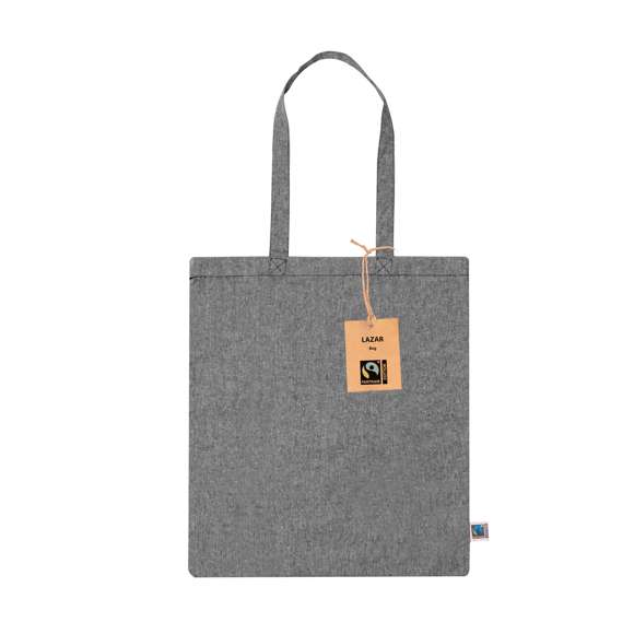 Bolsa de línea nature, fabricada en 100% algodón de 120g/m2. Con certificación Fairtrade (Comercio Justo) un sistema comercial solidario y alternativo al convencional que persigue el desarrollo de los pueblos y la lucha contra la pobreza. De acabado cosido, con asas largas de 70cm y resistencia hasta 7kg de peso. Disponible en diferentes y alegres colores. Incluida etiqueta Fairtrade y etiqueta con logotipo en cartón reciclado.