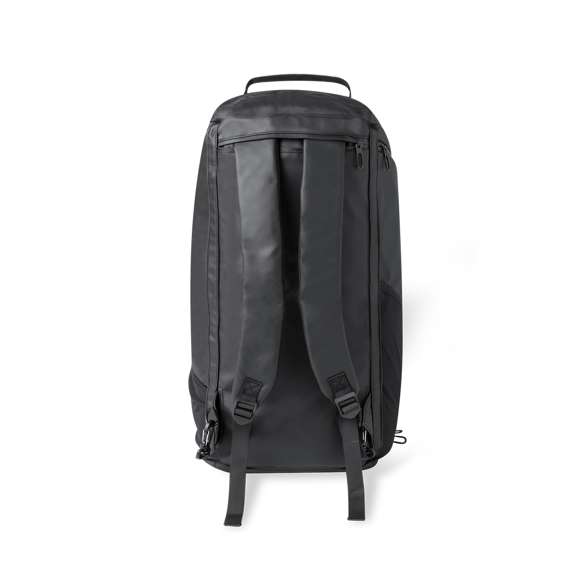 Bolso mochila confeccionado en resistente y suave polipiel. Su compartimento central se cierra mediante cremallera de doble tirador. Además, presenta un bolsillo lateral independiente y uno más en el otro extremo, ambos con cierre de cremallera; y en la base uno especialmente diseñado para zapatos. También incluye bolsillo exterior de rejilla. Ofrece tres opciones de transporte: como mochila, gracias a las asas acolchadas y plegables; como bolso de mano; o bien como bandolera gracias a su cinta para el hombro ajustable. Las cremalleras están discretamente ocultas para un diseño más elegante. Presentado en bolsa individual.