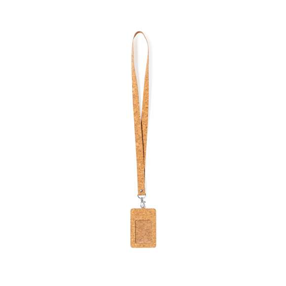 Identificador lanyard fabricado en corcho. Suave cordón hecho con corcho natural con cierre de mosquetón giratorio y un portatarjetas con ventanilla de PVC. Elaborado con elementos vegetales para así fomentar la utilización de materias primas naturales y reducir las emisiones contaminantes.