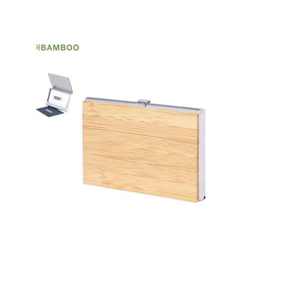 Elegante tarjetero fabricado en suave bambú, con tapas duras y cierre de presión. Destaca el detalle de bambú en la parte frontal y cuenta con un compartimento interior para almacenar tarjetas. Presentado en una bolsa individual de papel reciclado.Materiales como el bambú fomentan la utilización de materias primas naturales, reduciendo las emisiones contaminantes. Proviene de una planta de gran resistencia y versatilidad, con crecimiento y regeneración rápidos, siendo una excelente alternativa al uso de madera tradicional.