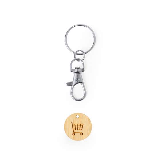 Llavero moneda fabricado en bambú. Con cierre de mosquetón giratorio y anilla para llaves. Incluye moneda fabricada en bambú con un grabado en forma del carro de la compra.Materiales como el bambú fomentan la utilización de materias primas naturales, reduciendo las emisiones contaminantes. Proviene de una planta de gran resistencia y versatilidad, con crecimiento y regeneración rápidos, siendo una excelente alternativa al uso de madera tradicional.