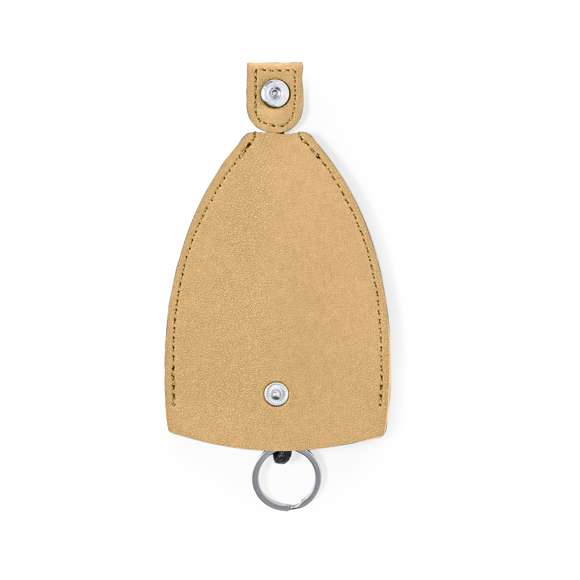 Original llavero-funda de polipiel para llevar siempre las llaves protegidas. Con mecanismo de guardado tirando del cordón y cierre de corchete. Disponible en variada gama de colores y presentado individualmente en bolsa de papel reciclado.