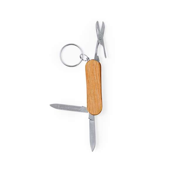 Práctico llavero multiherramienta, con accesorios fabricados en resistente acero inox y carcasa en madera natural. Con 3 funciones: tijeras, cuchillo y lima. Presentado en caja individual de diseño kraft.