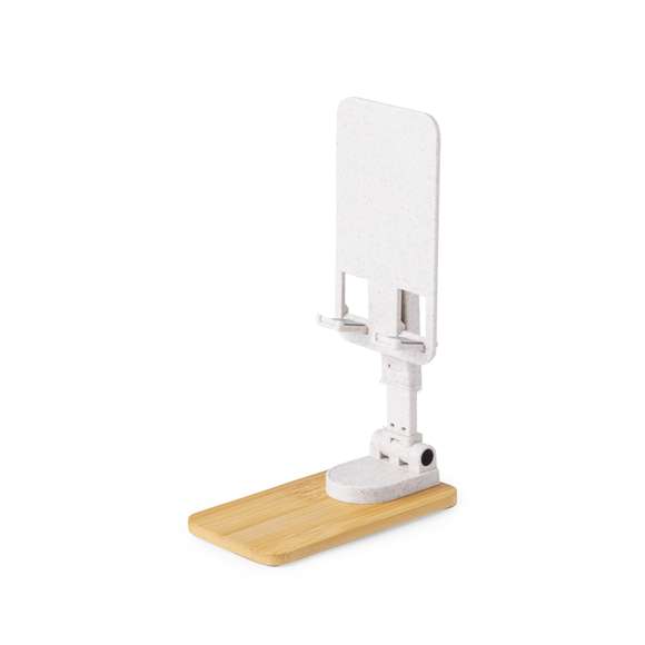 Soporte plegable para smartphones y tablets, fabricado en caña de trigo y con base en resistente bambú. Regulable en altura, con almohadillas de goma antideslizantes en base y soporte. Amplia superficie de marcaje, especialmente indicado para impresión en tampografía en el soporte y en láser en la base. Materiales como el bambú fomentan la utilización de materias primas naturales, reduciendo las emisiones contaminantes. Proviene de una planta de gran resistencia y versatilidad, con crecimiento y regeneración rápidos, siendo una excelente alternativa al uso de madera tradicional.La caña de trigo fomenta la utilización de materias primas naturales, reduciendo así las emisiones contaminantes.