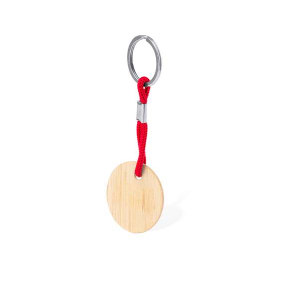 Práctico llavero redondo, fabricado en bambú, con cordón en variados colores. Es ideal para el marcaje en láser. Materiales como el bambú fomentan la utilización de materias primas naturales, reduciendo las emisiones contaminantes. Proviene de una planta de gran resistencia y versatilidad, con crecimiento y regeneración rápidos, siendo una excelente alternativa al uso de madera tradicional.