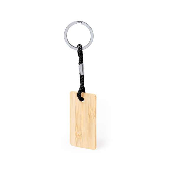 Práctico llavero rectangular, fabricado en bambú, con cordón en variados colores. Es ideal para el marcaje en láser. Materiales como el bambú fomentan la utilización de materias primas naturales, reduciendo las emisiones contaminantes. Proviene de una planta de gran resistencia y versatilidad, con crecimiento y regeneración rápidos, siendo una excelente alternativa al uso de madera tradicional.