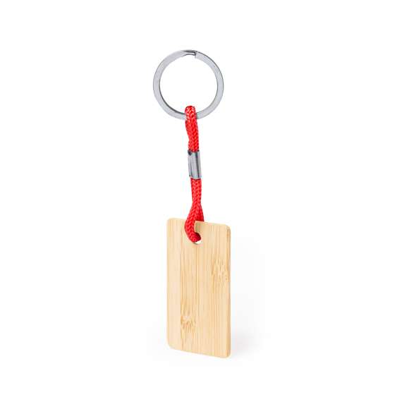 Práctico llavero rectangular, fabricado en bambú, con cordón en variados colores. Es ideal para el marcaje en láser. Materiales como el bambú fomentan la utilización de materias primas naturales, reduciendo las emisiones contaminantes. Proviene de una planta de gran resistencia y versatilidad, con crecimiento y regeneración rápidos, siendo una excelente alternativa al uso de madera tradicional.