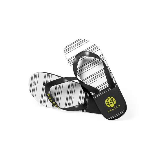 Par de chanclas fabricadas en EVA y PVC. Suela hecha de resistente EVA para una alta durabilidad, con atractivo diseño bicolor, y tiras ergonómicas fabricadas en PVC a juego. Disponibles en una variada gama de colores vibrantes con diseño en blanco adaptándose a cualquier estilo. Tallas 36-38 y 42-44. Cada par presentado en bolsa reciclada.