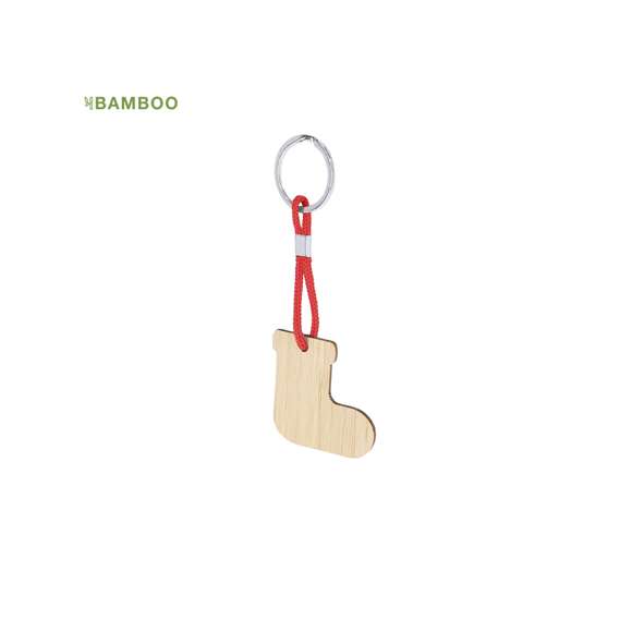 Llavero fabricado en bambú con motivos navideños. Disponible en cuatro originales diseños: Reno, Gorro Papá Noel, Árbol y Calcetín.Materiales como el bambú fomentan la utilización de materias primas naturales reduciendo las emisiones contaminantes. Además, el bambú proviene de una planta de gran resistencia y versatilidad, con crecimiento y regeneración rápida, siendo una excelente alternativa al uso de madera tradicional.