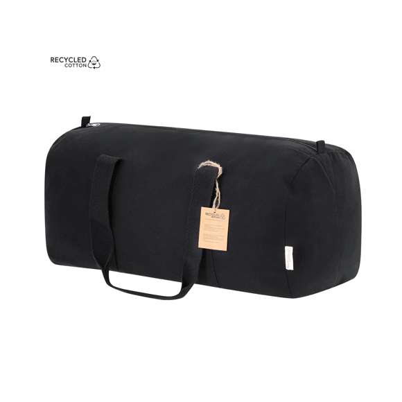 Bolso fabricado en material 100% canvas reciclado. Con resistentes asas alrededor del bolso y compartimento principal con cierre de cremallera. Etiqueta exterior con logotipo Algodón Reciclado.