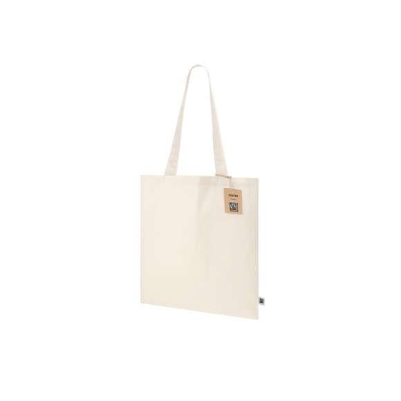 Bolsa confeccionada principalmente en algodón de 140g/m2. Con certificación Fairtrade (Comercio Justo) un sistema comercial solidario y alternativo al convencional que persigue el desarrollo de los pueblos y la lucha contra la pobreza. De acabado cosido, con asas largas de 70cm y resistencia hasta 7kg de peso. Incluida etiqueta Fairtrade y hangtag distintivo en cartón reciclado.