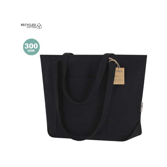 Bolsa confeccionada principalmente en resistente algodón reciclado de 300g/m2. De acabado cosido con fuelle y asas largas de 70cm reforzadas. Incluye bolsillo exterior de fácil acceso. Logotipo en etiqueta lateral y resistencia hasta 10kg de peso.