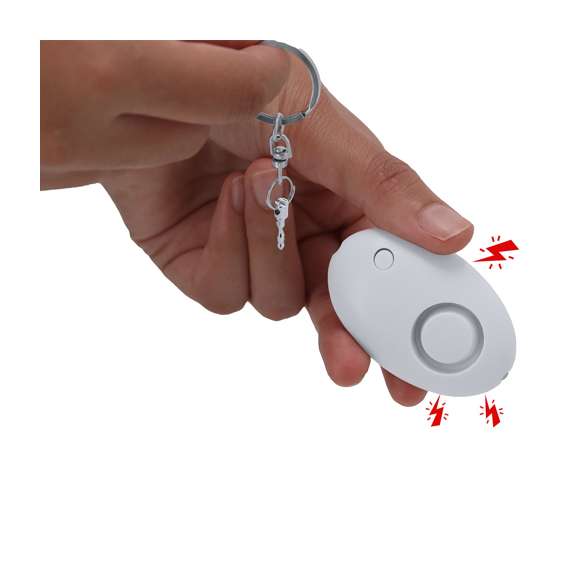 Alarma Personal con linterna LED, equipada con un potente timbre de volumen  para alertar de emergencias. Con sencilla activación mediante un sistema de tirado de la anilla que activa la alarma de inmediato. Incorpora una linterna LED, ideal para proporcionar iluminación en condiciones de baja visibilidad. Incluye un mosquetón y una anilla metálica para facilitar su sujeción a bolsos, mochilas o llaveros, etc. Funcionamiento a pilas de botón (incluidas).