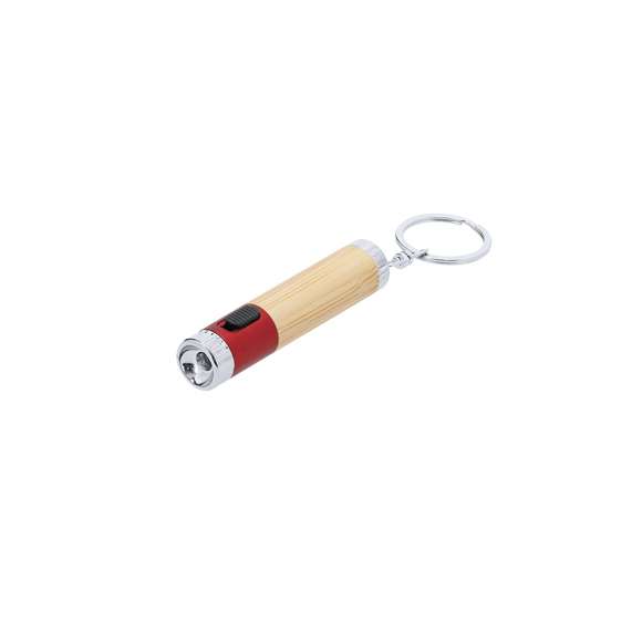 Llavero linterna fabricado en bambú y ABS. Con 1 LED alimentado con pilas de botón (incluidas) con botón on/off en lateral y elementos decorativos cromados.Materiales como el bambú fomentan la utilización de materias primas naturales, reduciendo las emisiones contaminantes. Proviene de una planta de gran resistencia y versatilidad, con crecimiento y regeneración rápidos, siendo una excelente alternativa al uso de madera tradicional.