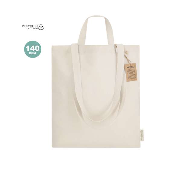 Bolsa confeccionado principalmente en algodón reciclado de 140g/m2. Cuenta con doble asa: asas largas de 70 x 2,5 cm y asas cortas de 30 x 2,5 cm. Incluye distintivo de Algodón Reciclado. Resistencia hasta 6 kg de peso.