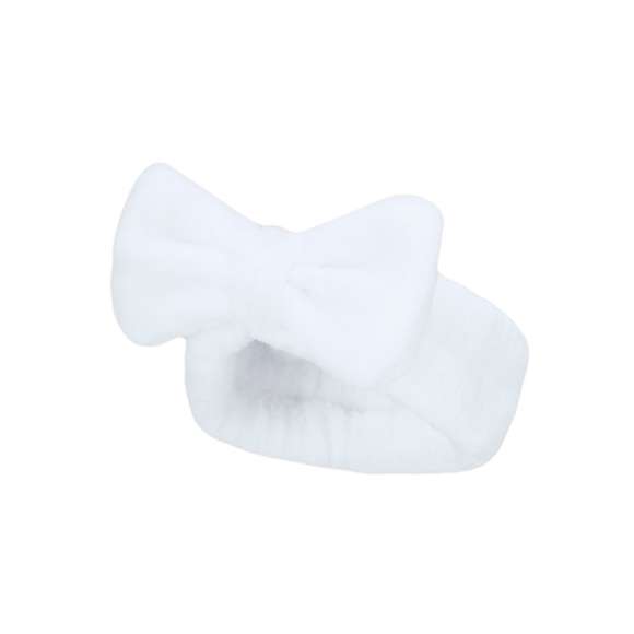 Diadema en forma de cinta para el cabello, adornada con un elegante lazo. Confeccionada en suave y elástico poliéster, ideal para facilitar la rutina de lavado facial.