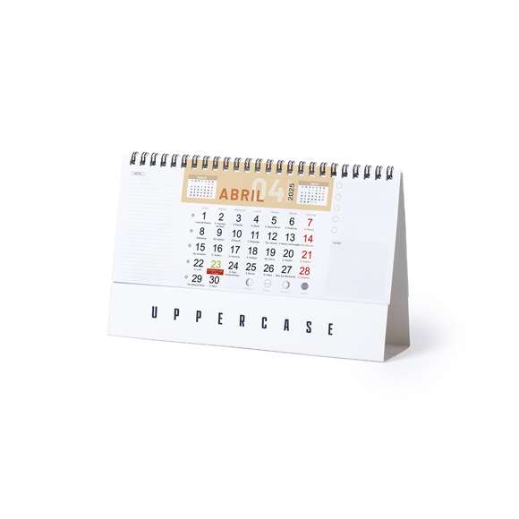 Calendario de sobremesa de anillas con cuerpo triangular en cartón. Diseño mes en curso/ mes anterior/ mes siguiente, santoral y espacio para notas. Amplia superficie de marcaje en ambas caras.