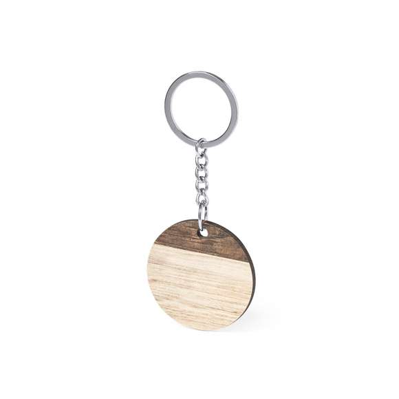 Llavero redondo, fabricado en madera natural y de original acabado bicolor. Amplia superficie de marcaje, con anilla y cadena metálicas y distintivo Made In Europe.