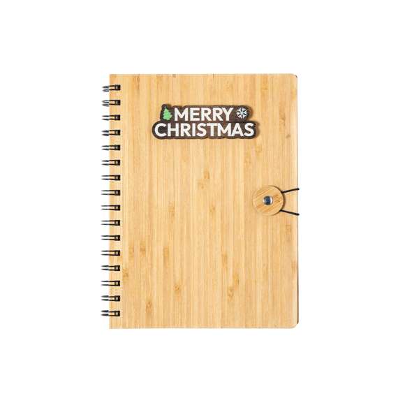 Libreta de anillas de línea nature y diseño navideño. Con tapas rígidas de bambú y original cierre elástico. Incluye 80 hojas con disposición a una raya y diseño eco.