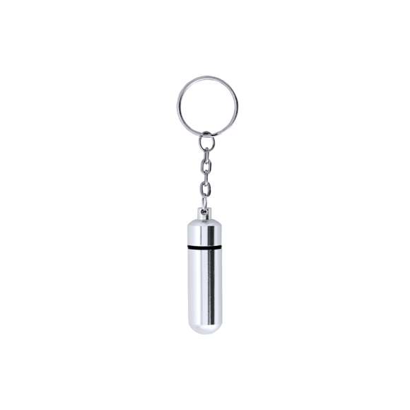Llavero pastillero de discreto diseño con cuerpo en aluminio de acabado brillante y cierre a rosca.