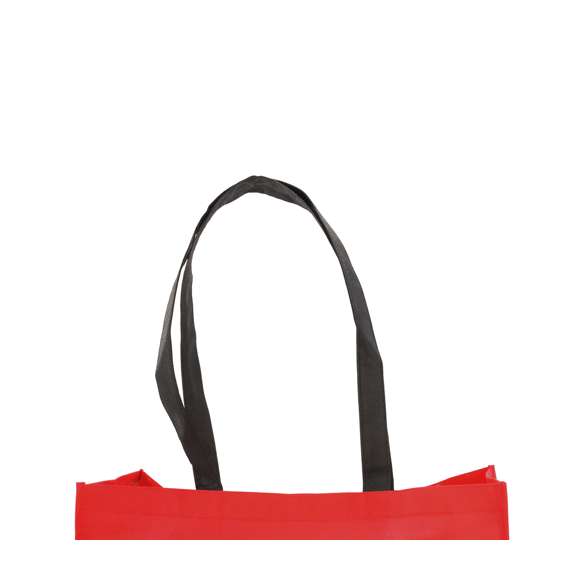 Bolsa en non-woven de 100g/m2, en variada gama de vivos colores. Con asas largas de 70cm en color negro, fuelle reforzado con ribete a juego y acabado cosido.