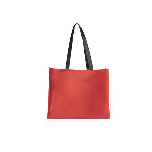 Bolsa en non-woven de 100g/m2, en variada gama de vivos colores. Con asas largas de 70cm en color negro, fuelle reforzado con ribete a juego y acabado cosido.
